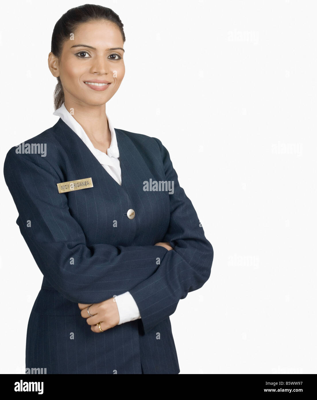 Portrait of an air hostess smiling Stock Photo - Alamy