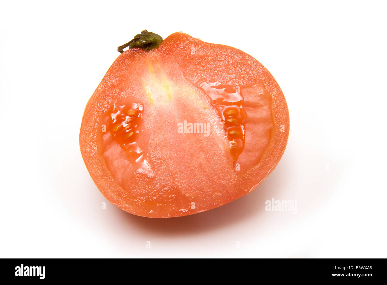 Beef tomato isolated on a white studio background Stock Photo - Alamy