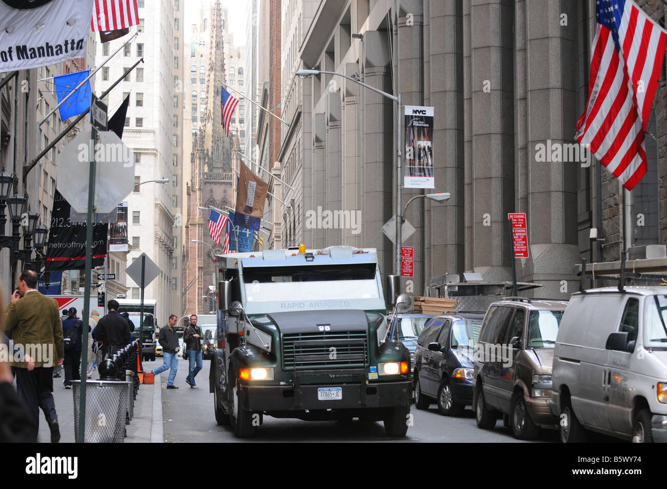 armored car driving on wall street near stock exchange manhattan new york city usa Stock Photo