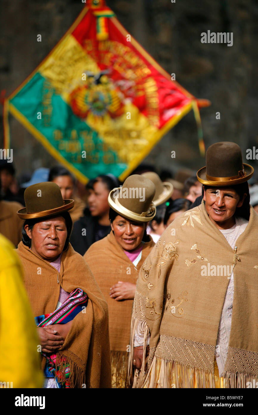 Women in traditional dress in La Paz Bolivia. These women were taking part in a procession. Stock Photo