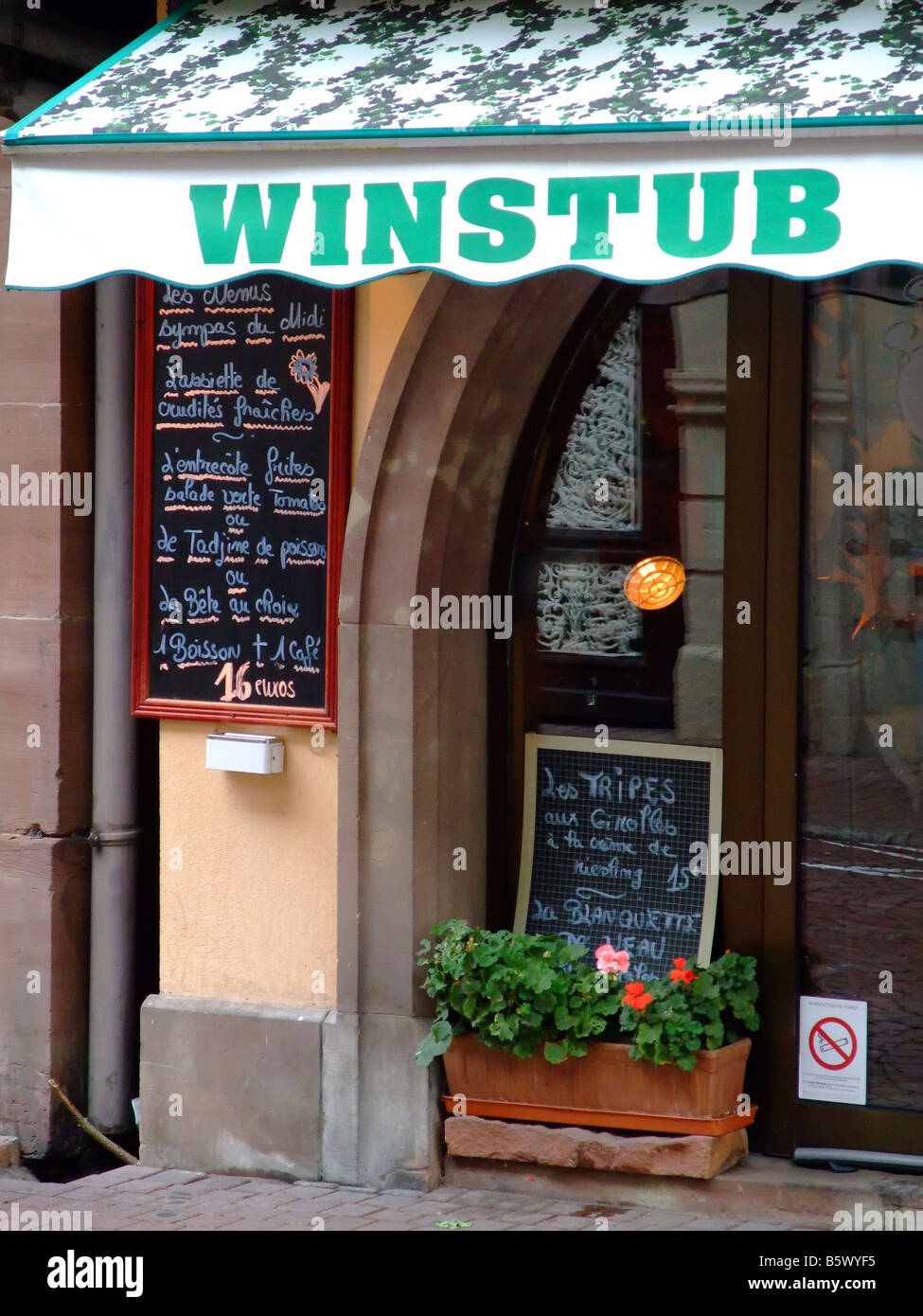 A winstub a wine bar and also a rural restaurant at Obernai – Alsace region - France Stock Photo