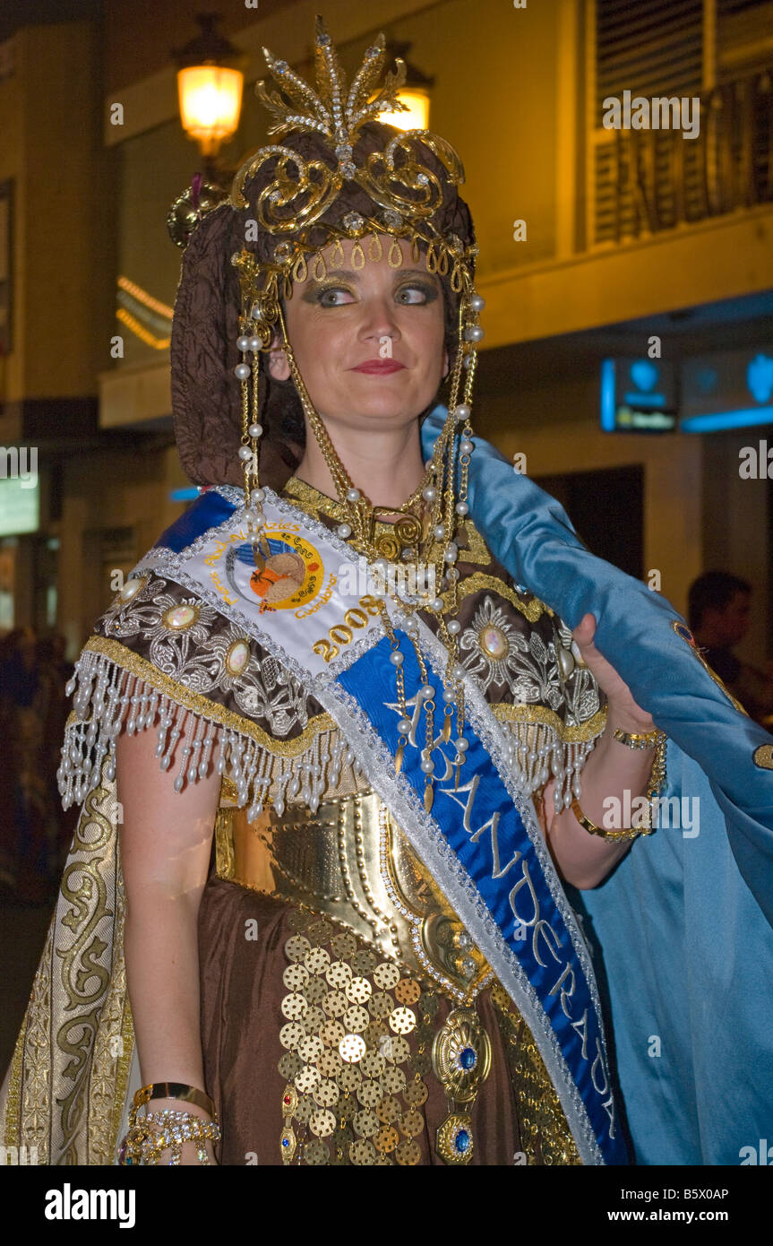 Female in Traditional Costume Leading The Parade at the Fiesta of Moors and Christians Guardamar Spain Spanish Fiestas Stock Photo
