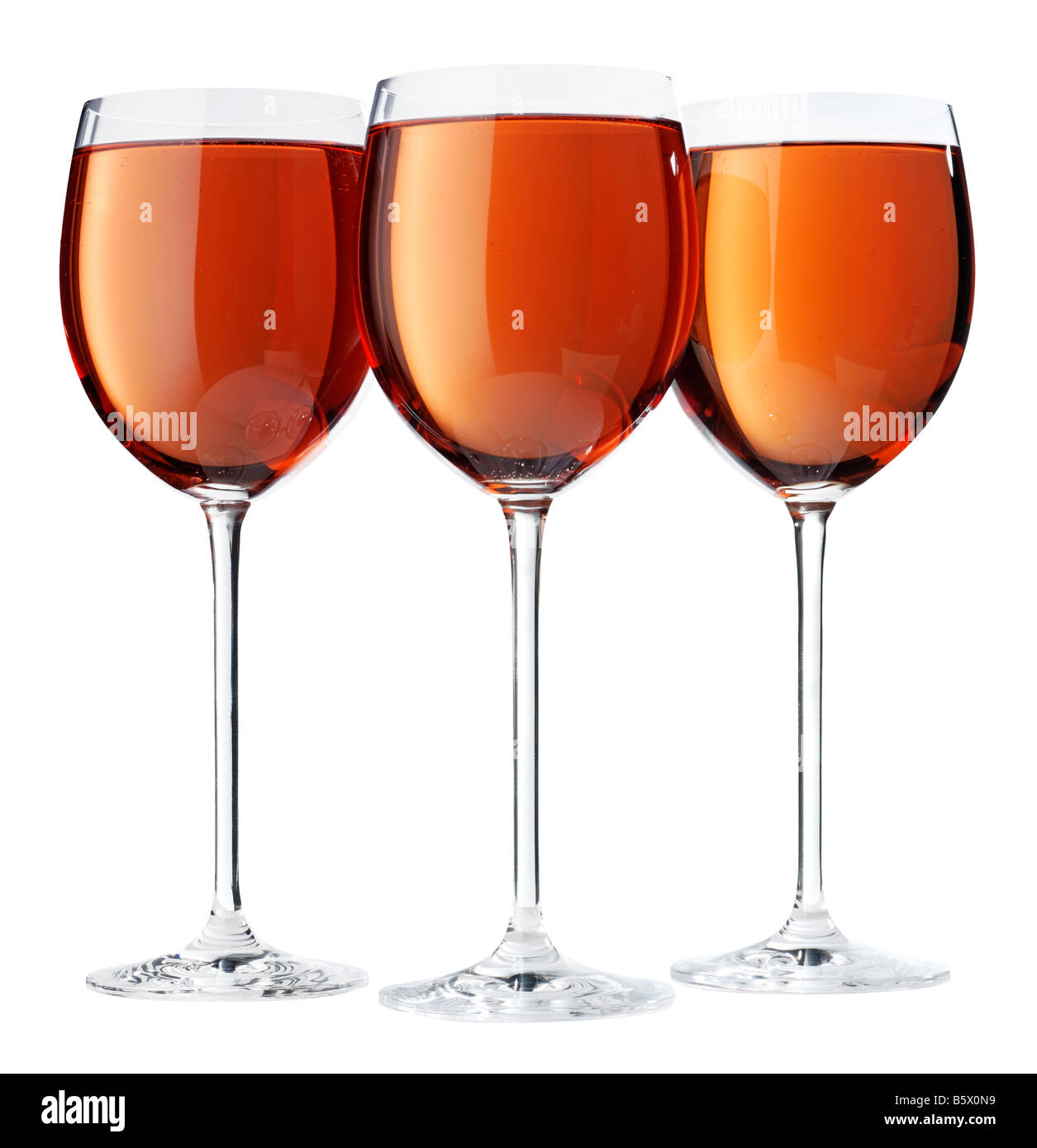 THREE GLASSES OF ROSE WINE Stock Photo