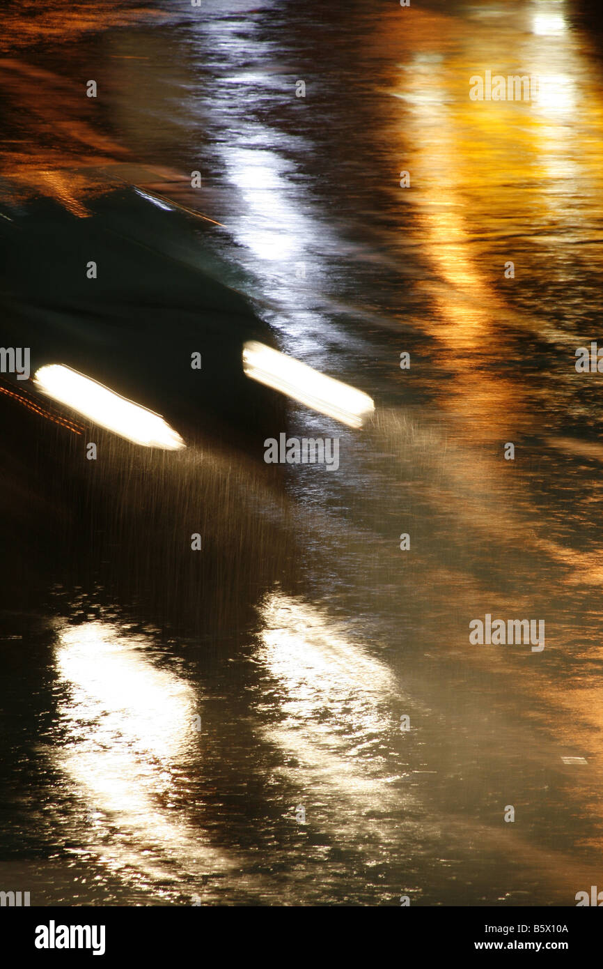 fast car driving in heavy rain at night in town Stock Photo Alamy
