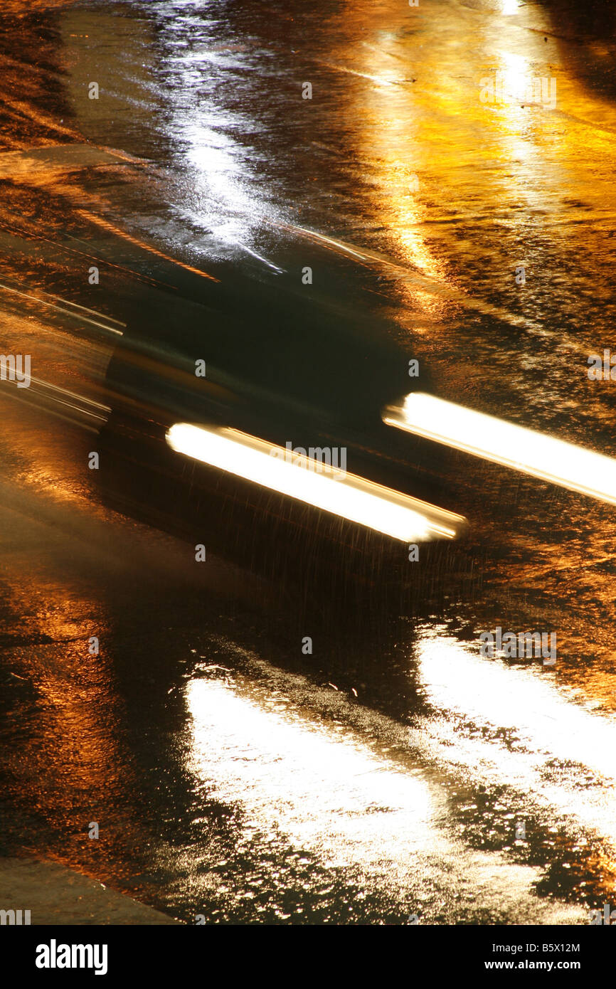 fast car driving in heavy rain at night in town Stock Photo Alamy