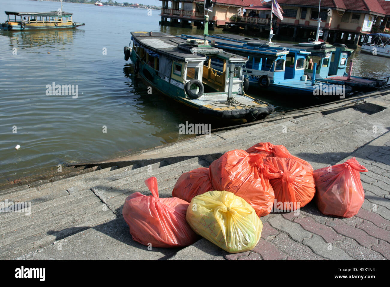 Goods to be transported by boat in Kuala Terengganu. Stock Photo