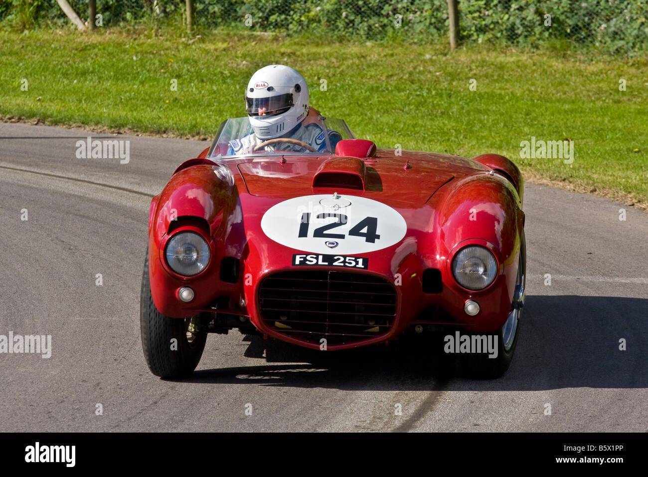 1954 type Lancia D24 Le Mans racer with driver Anthony MacLean at Goodwood Festival of Speed, Sussex, UK. Stock Photo