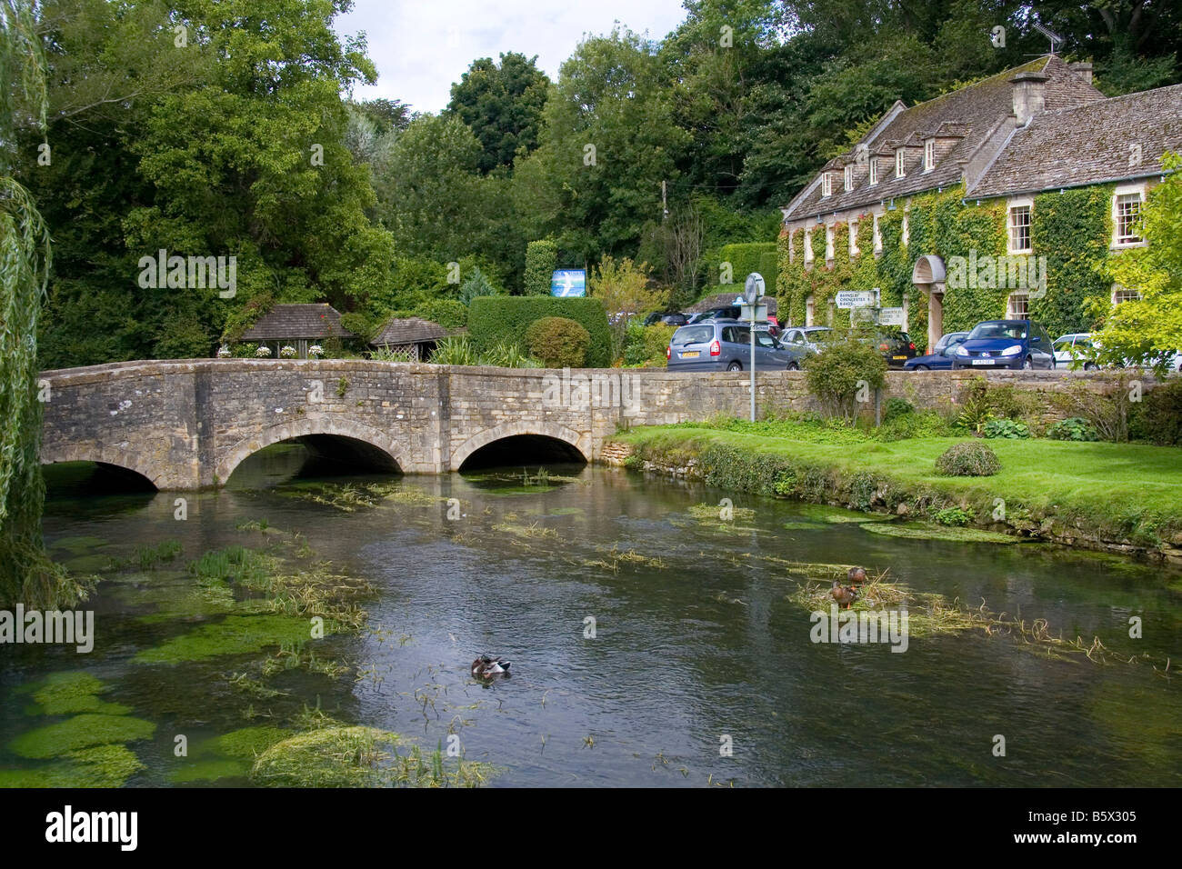 Trout stream in the village of Bibury Gloucestershire England Stock