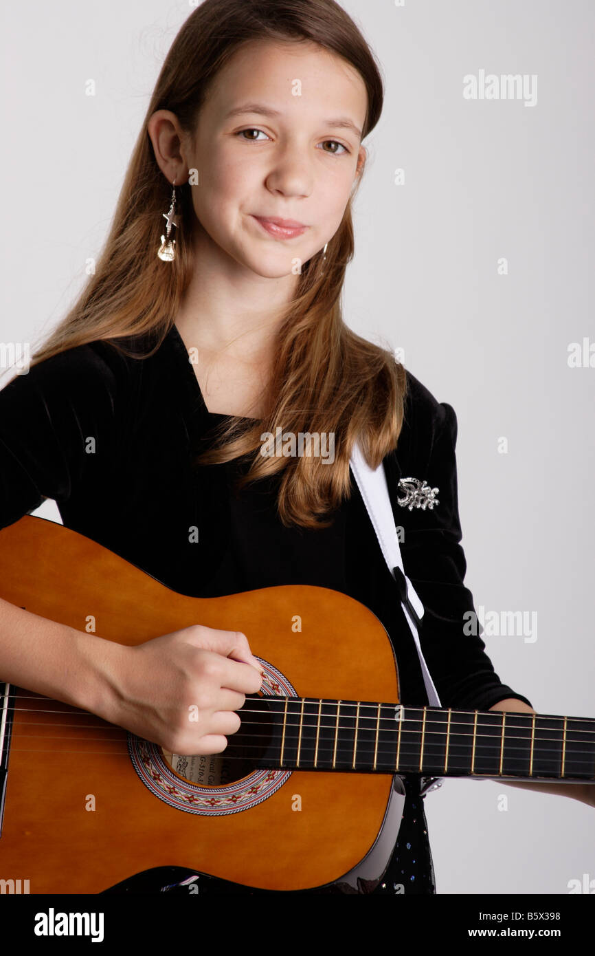 Portrait of a girl with a guitar Stock Photo - Alamy