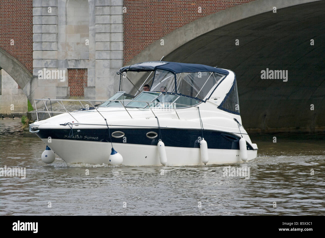 Motor Cruiser Boat River Thames Passing under Hampton Court Bridge