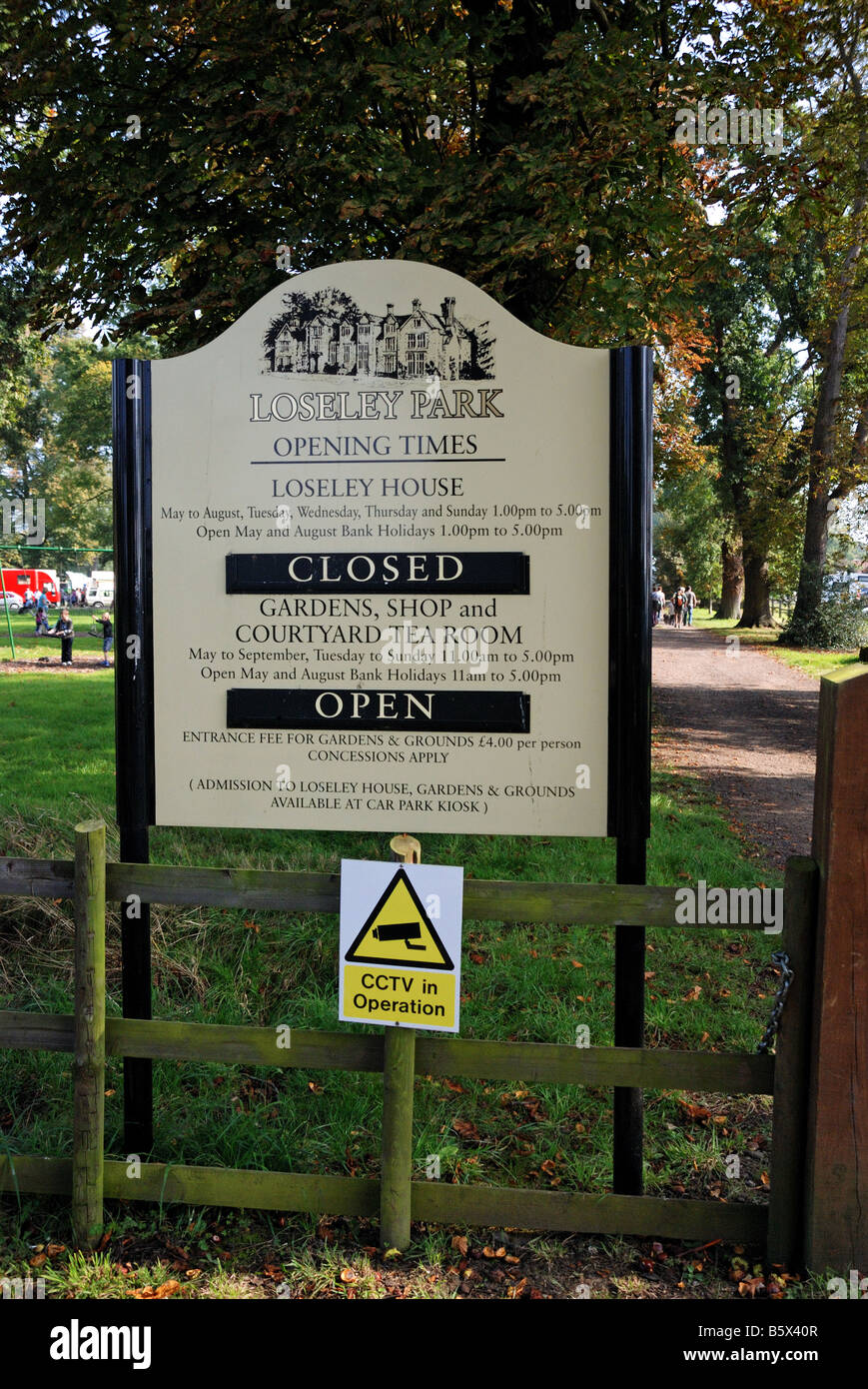 Signboard for Loseley Park at Loseley Park for opening times entrance fee and CCTV is in operation LOSELEY PARK BUILT IN 1562 Stock Photo
