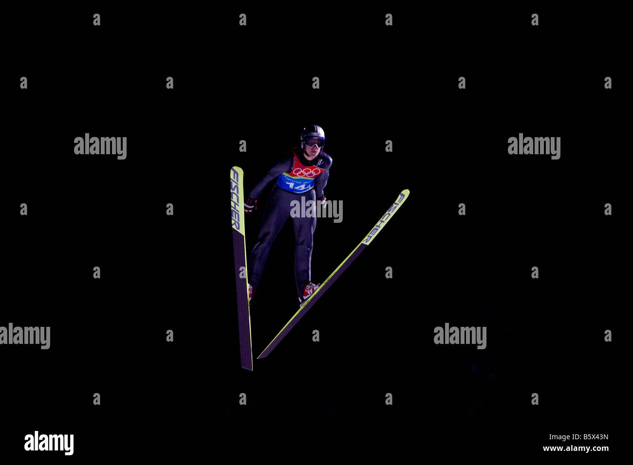 Ski Jumper in action Stock Photo