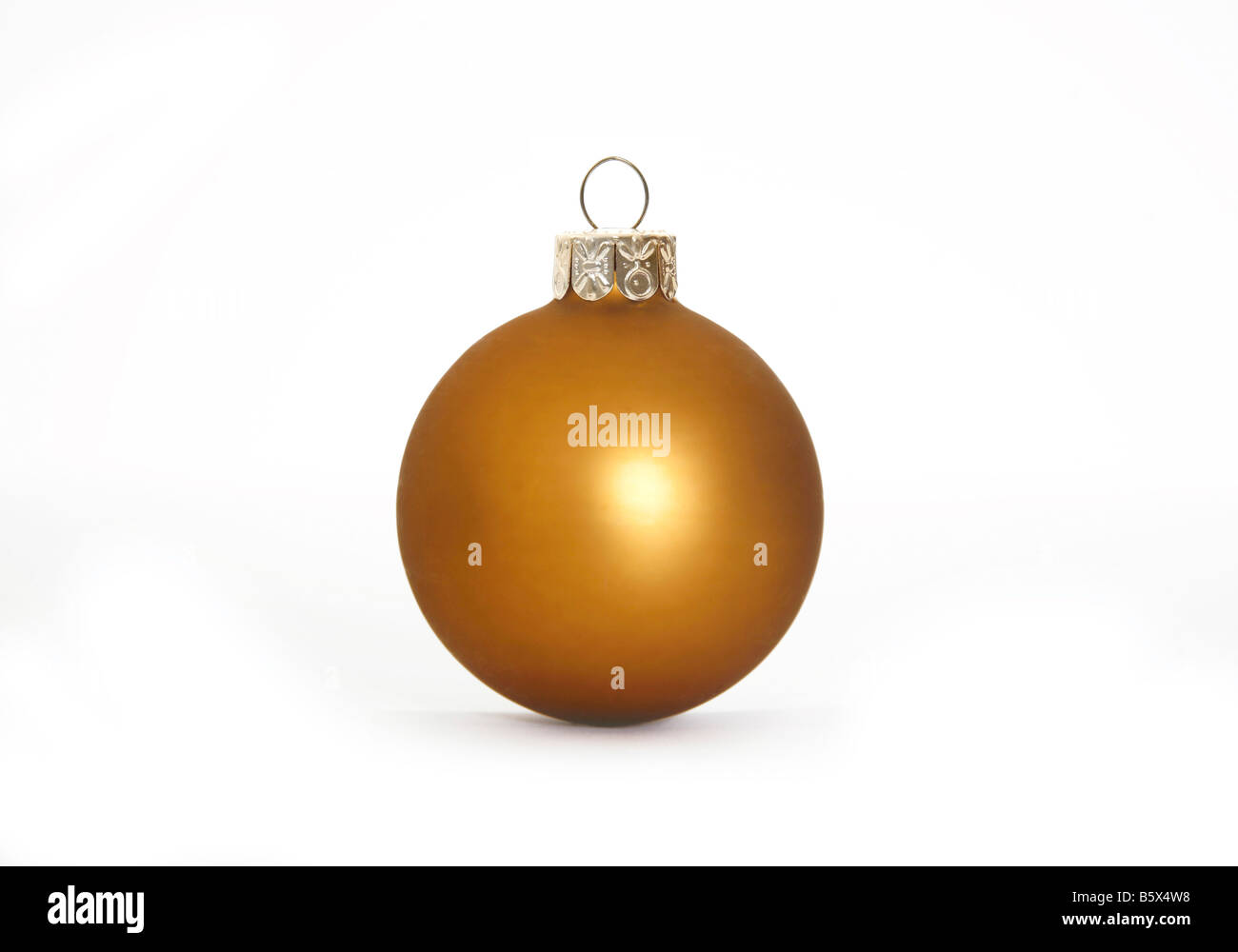 Golden Christmas ball decoration with drop shadow Stock Photo