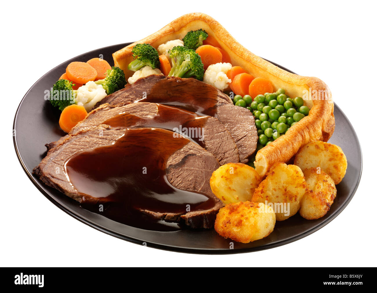 TRADITIONAL ROAST BEEF DINNER WITH YORKSHIRE PUDDING,CUT OUT Stock