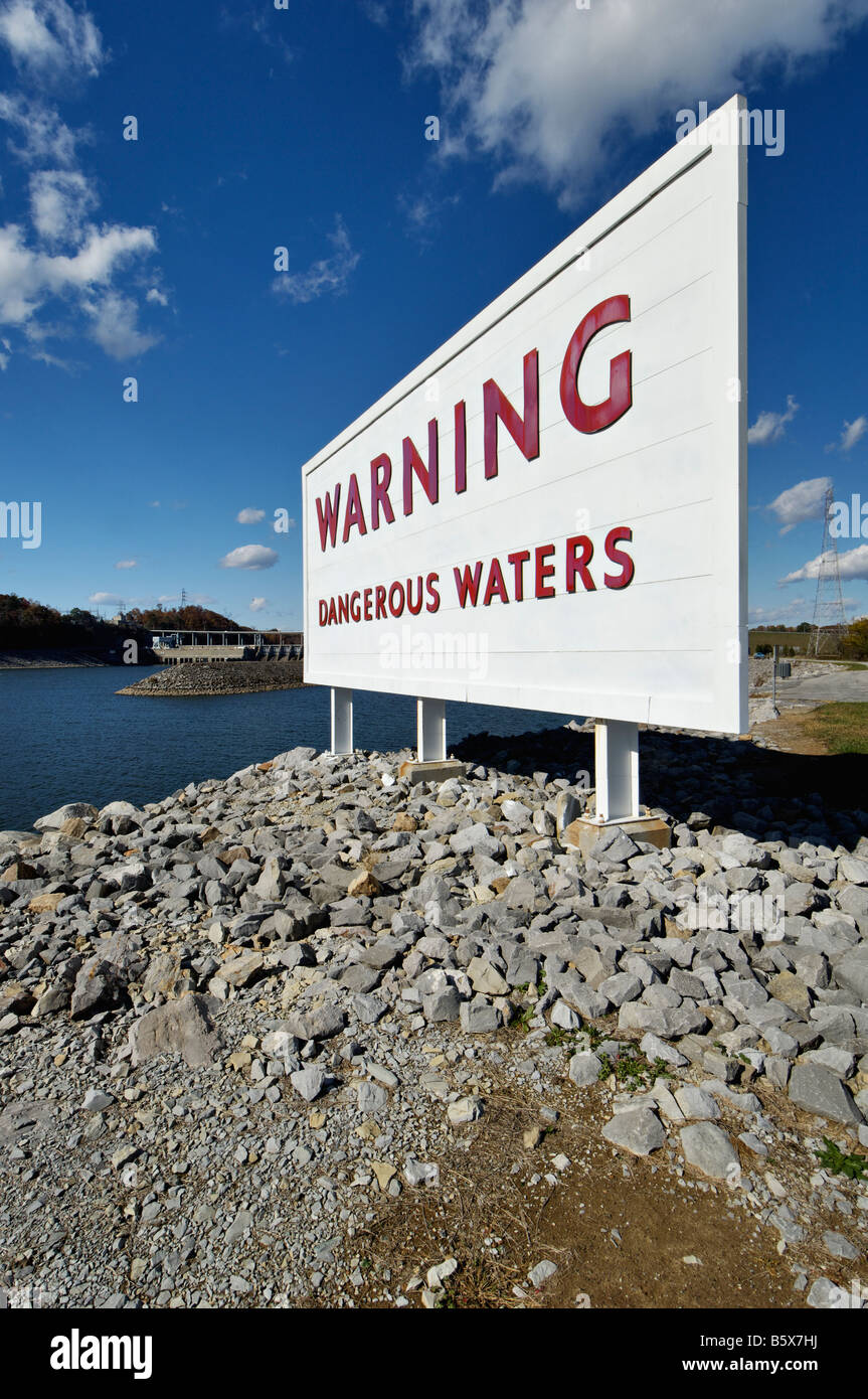 Dangerous Waters Warning Sign on Shore at the Tailwaters of the Watts
