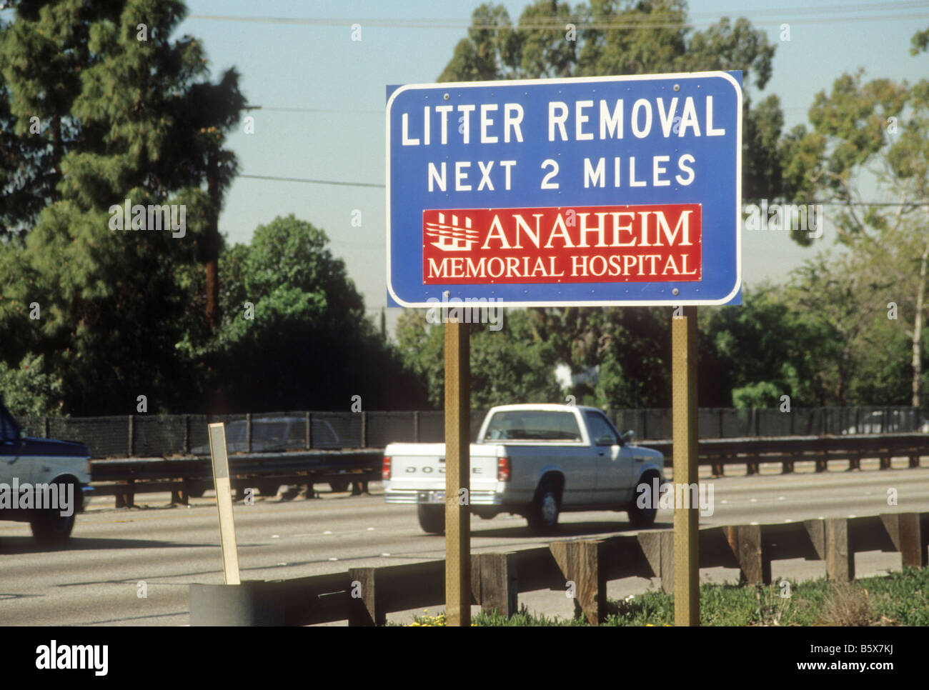 Litter removal public service sign on highway. Stock Photo