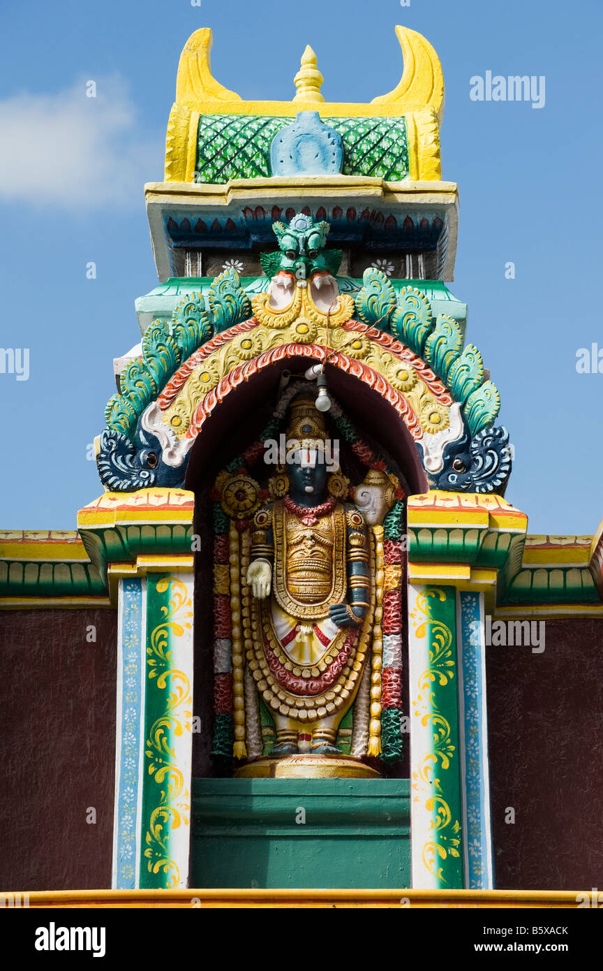 Hindu deity, Lord Venkateswara, painted statue, on the Lord Lakshmi Narasimha Swamy Temple in Kadiri, Andhra Pradesh, India Stock Photo