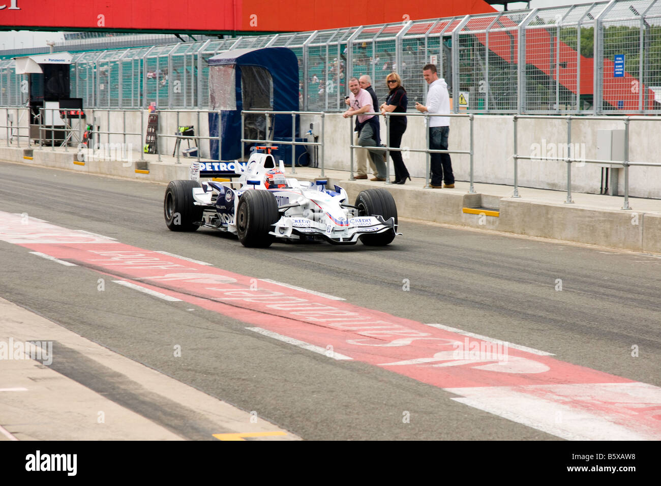 BMW Sauber Formula 1 car leaving the pit lane Stock Photo