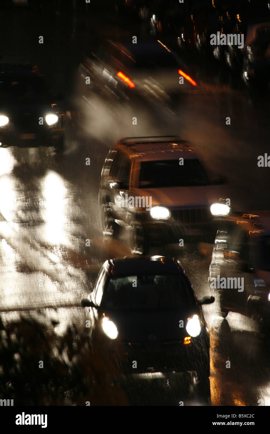fast car driving in heavy rain at night in town Stock Photo Alamy