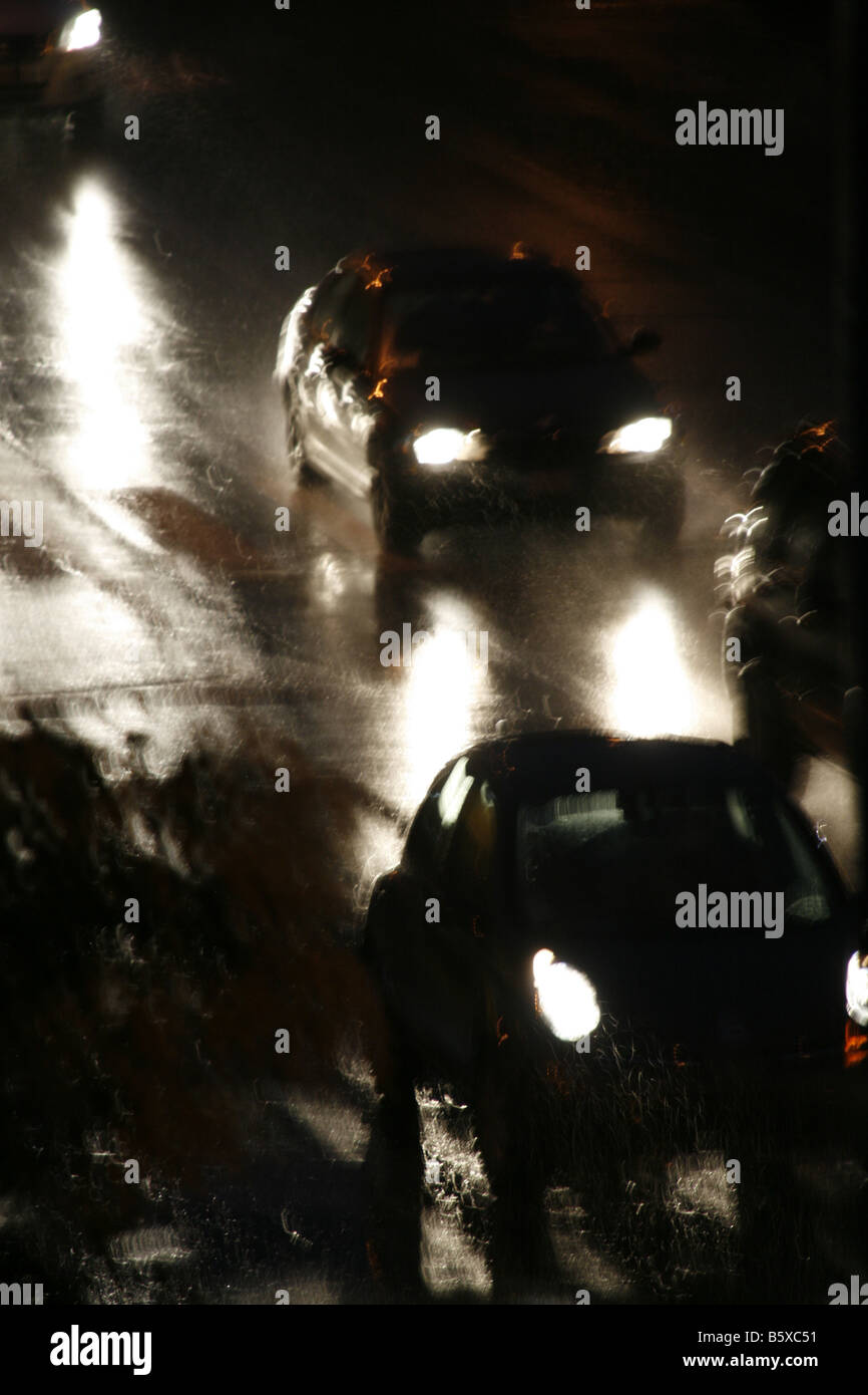 fast car driving in heavy rain at night in town Stock Photo Alamy