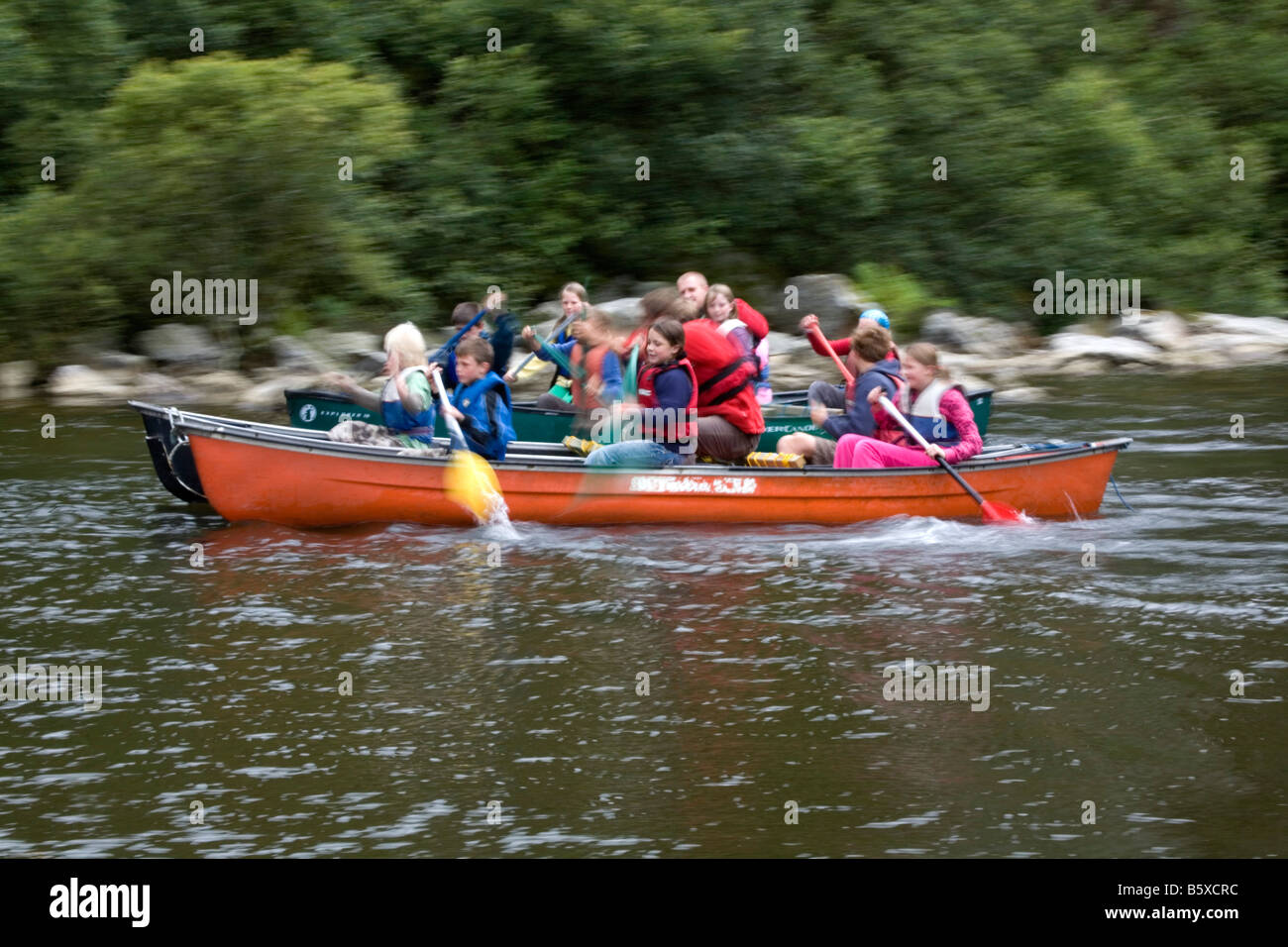 paddling a canoe at goodygrane open day bishops forum charity cornwall Stock Photo