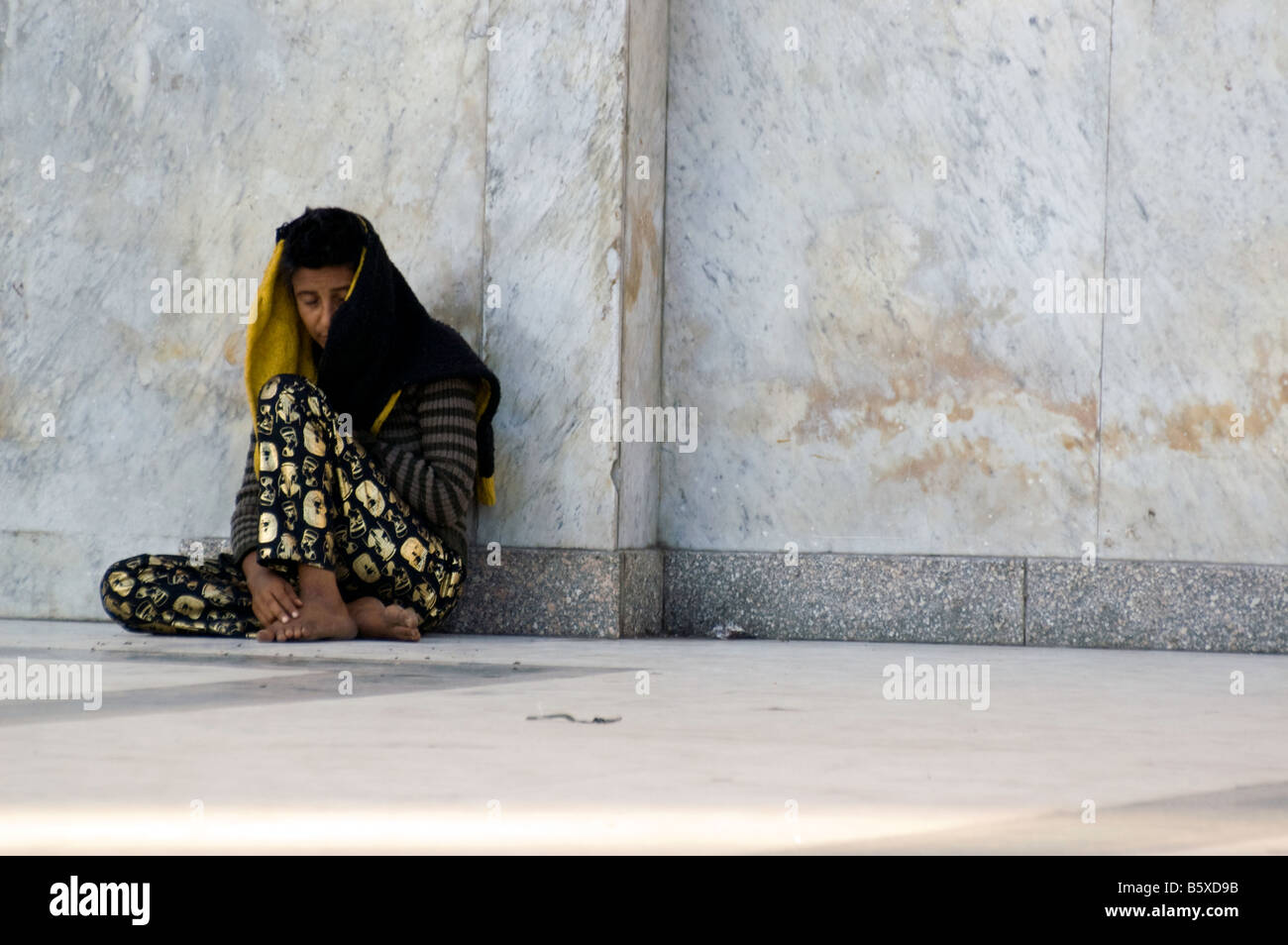 Old woman begging on the streets of Cairo Stock Photo