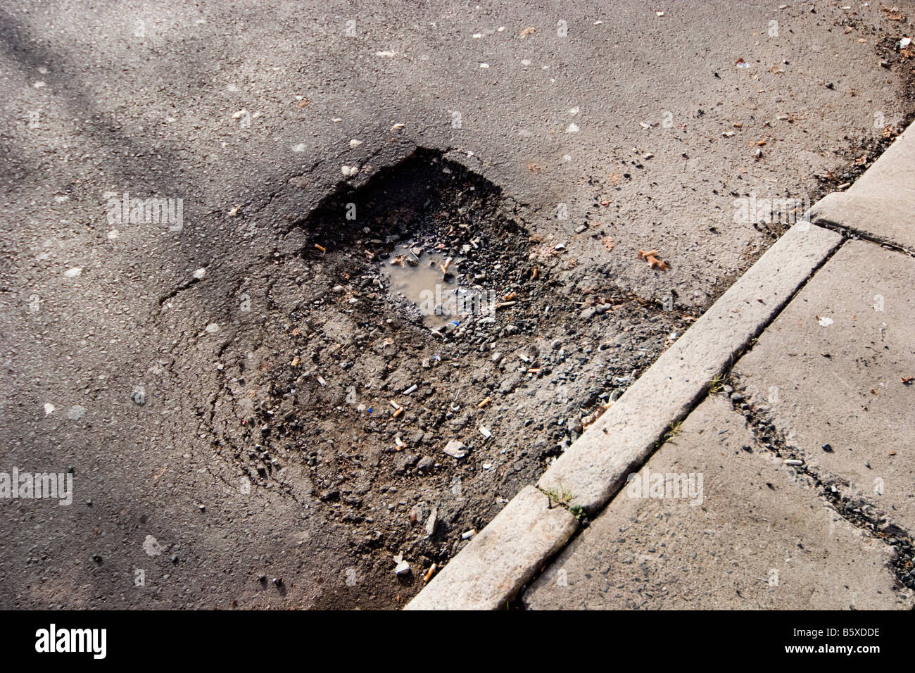 Hole in a city street Stock Photo Alamy