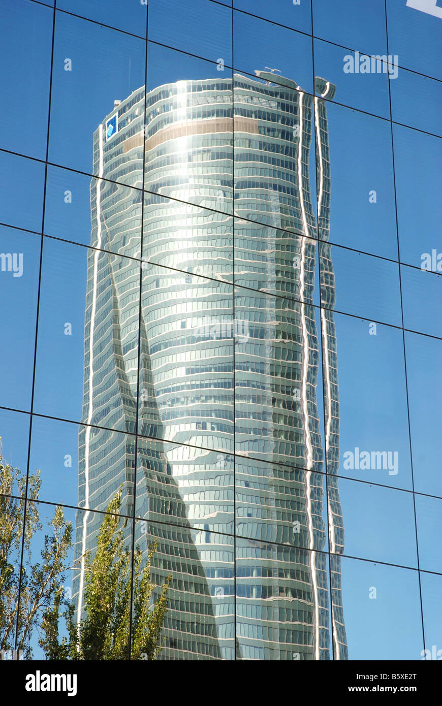 Tower Espacio reflected on glass facade. Madrid. Spain. Stock Photo