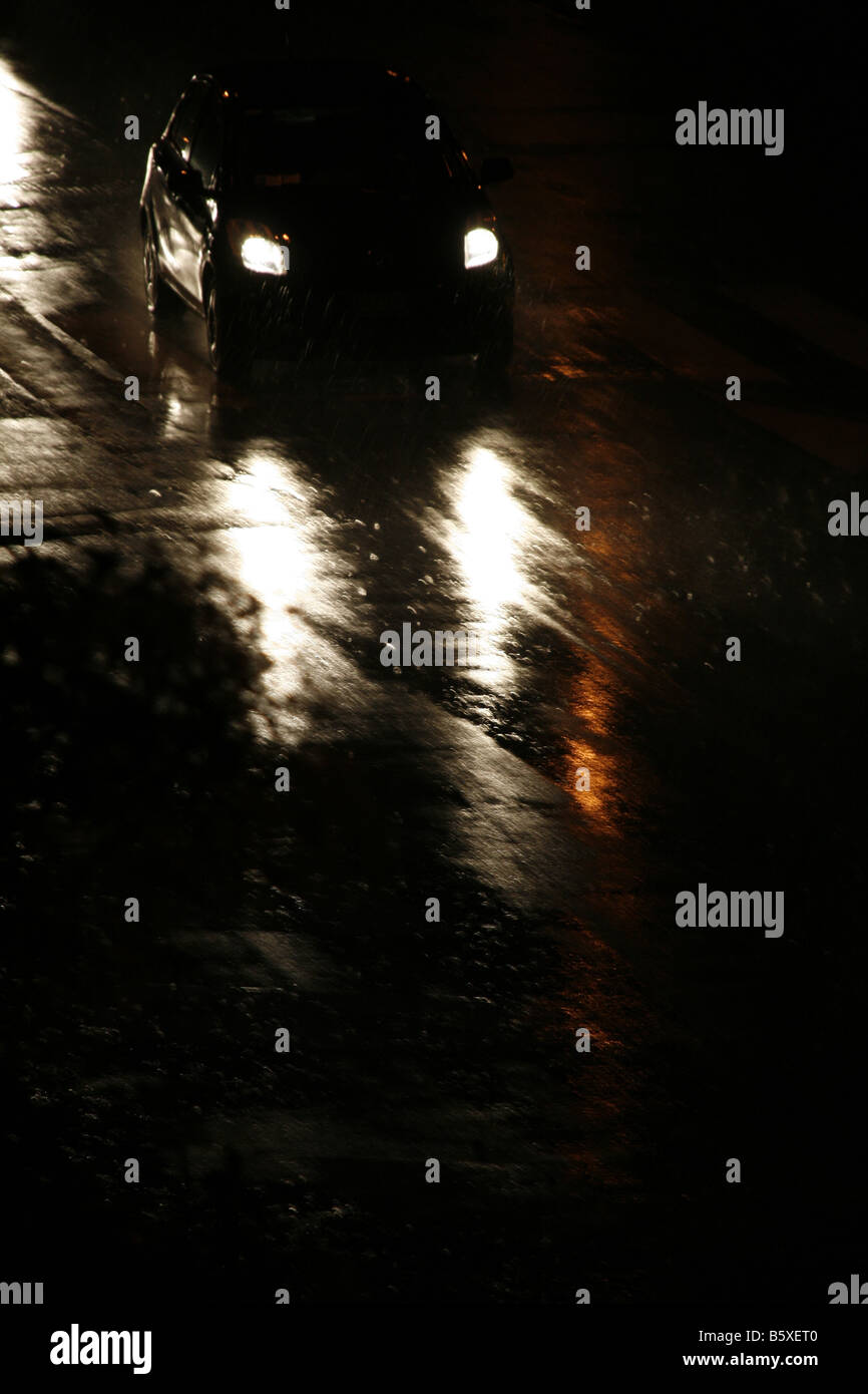 fast car driving in heavy rain at night in town Stock Photo Alamy