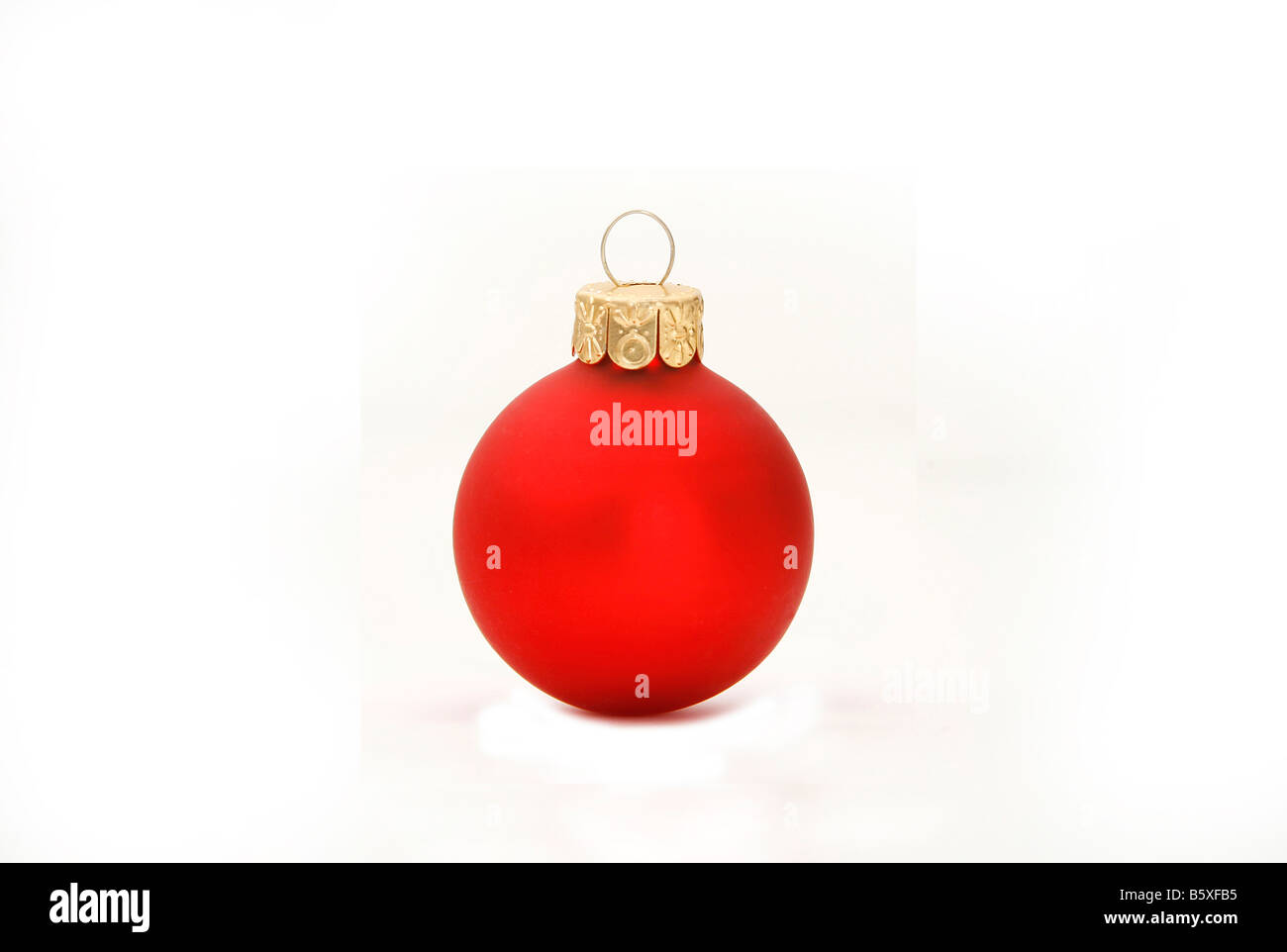 Red Christmas ball decoration with drop shadow Stock Photo
