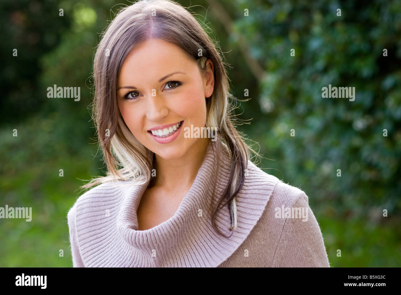 Portrait of woman wearing a jumper Stock Photo Alamy
