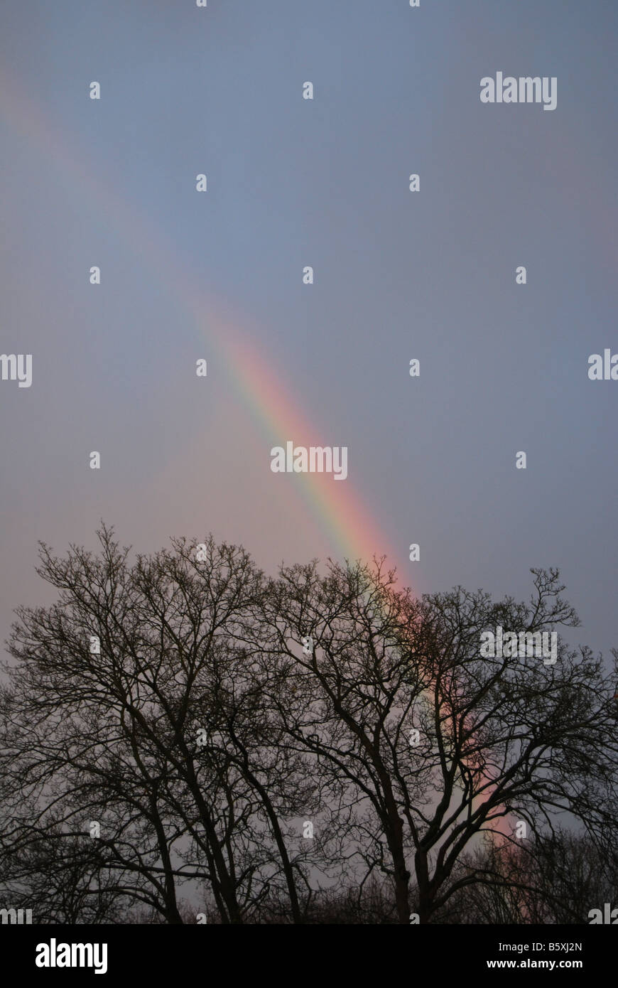 rainbow in stormy sky Stock Photo