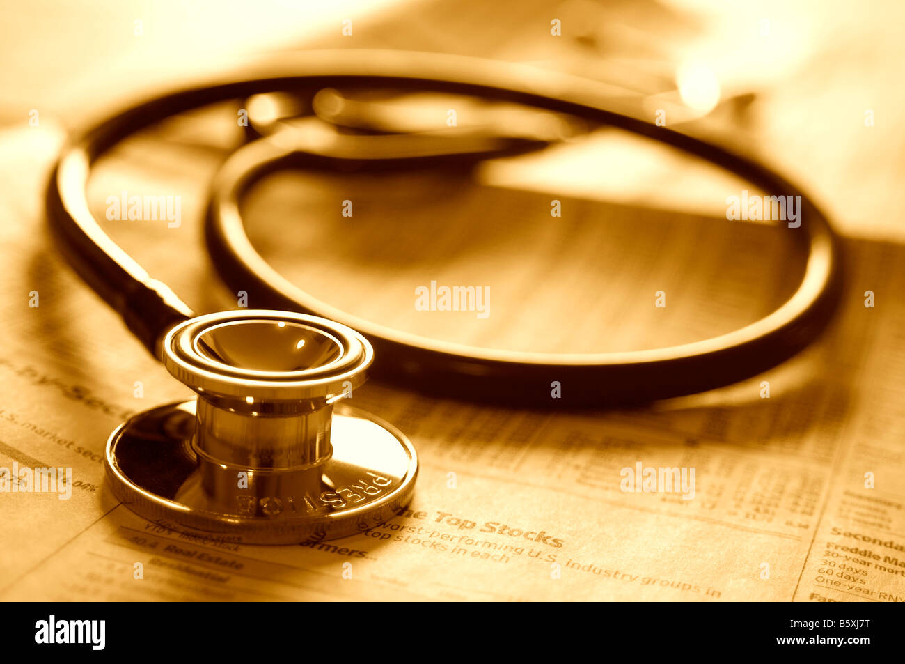 Doctor's stethoscope on investment business newspaper Stock Photo - Alamy Doctor's stethoscope on investment business newspaper Stock Photo - Alamy
