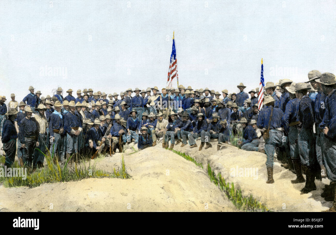 Colonel Roosevelt and Rough Riders where they charged over San Juan Hill Spanish American War. Hand-colored halftone of a photograph Stock Photo