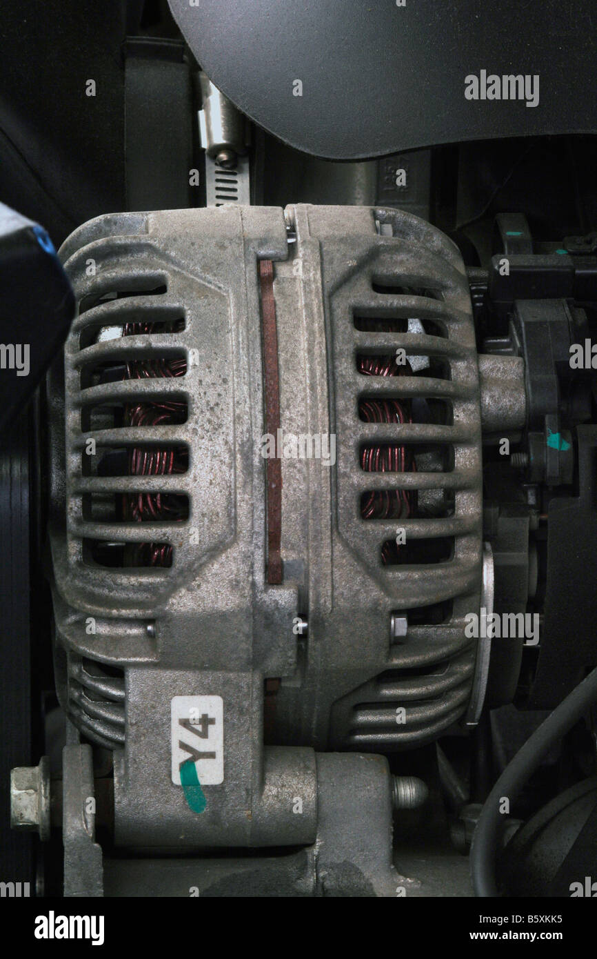Automobile alternator located in engine compartment Stock Photo Alamy