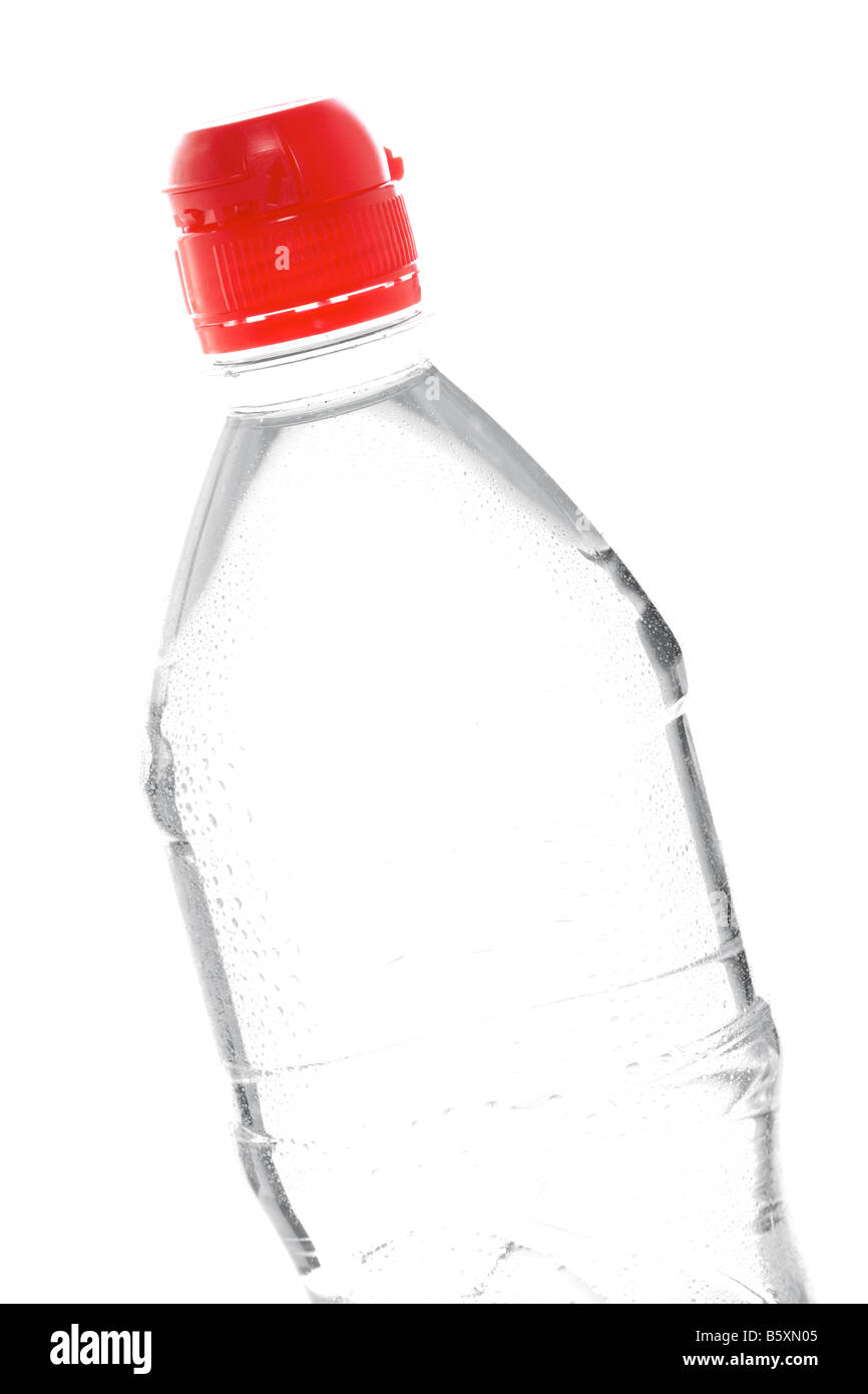A bottle of mineral water with droplets reflecting on white background Stock Photo