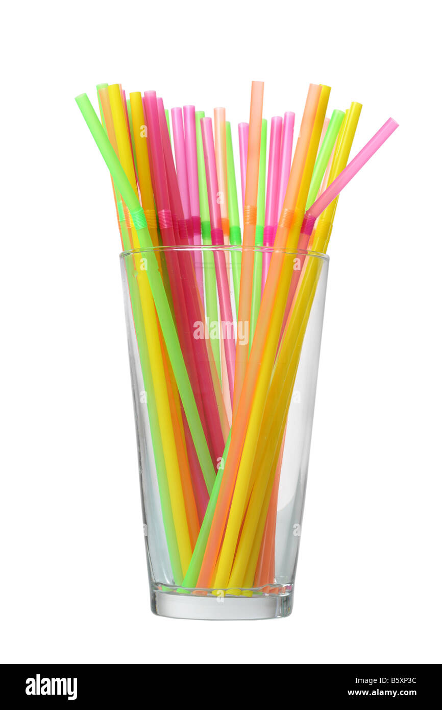 Glass of colorful straws cutout isolated on white background Stock Photo