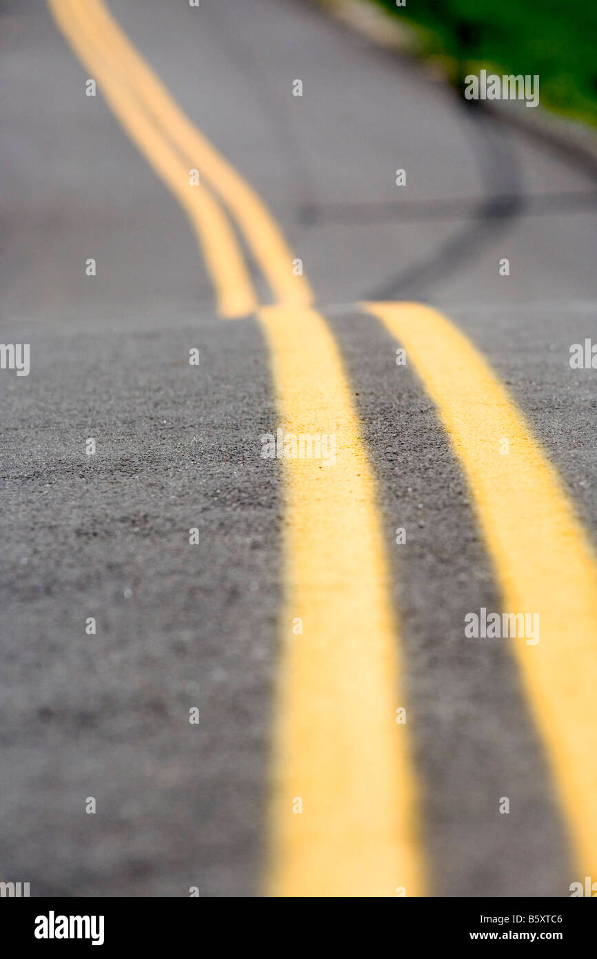 A view of a lonely and empty country road. Stock Photo