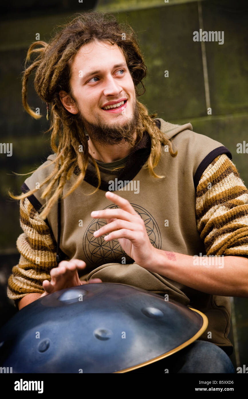 Musician from Hangplayinghedgemonkeys playing the percussion instrument