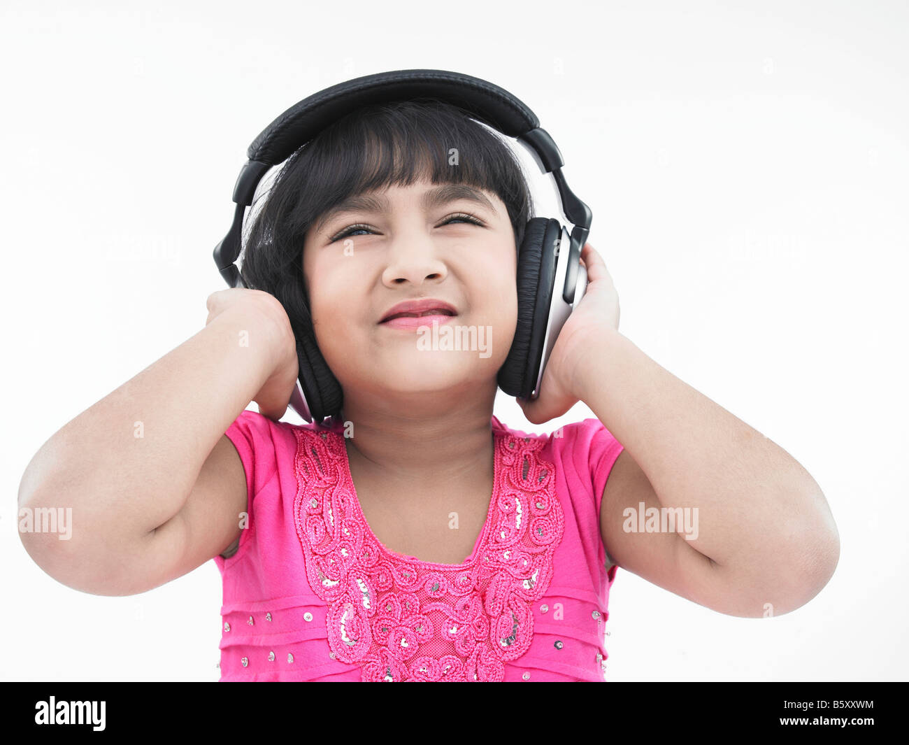 Indian Child Girl Headphone Hearing High Resolution Stock Photography and  Images - Alamy