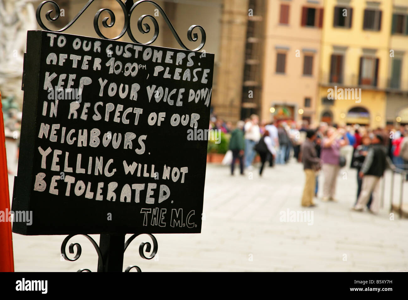 'Quiet please' sign at pavement restaurant, Piazza della Signoria, Florence, Italy. Stock Photo