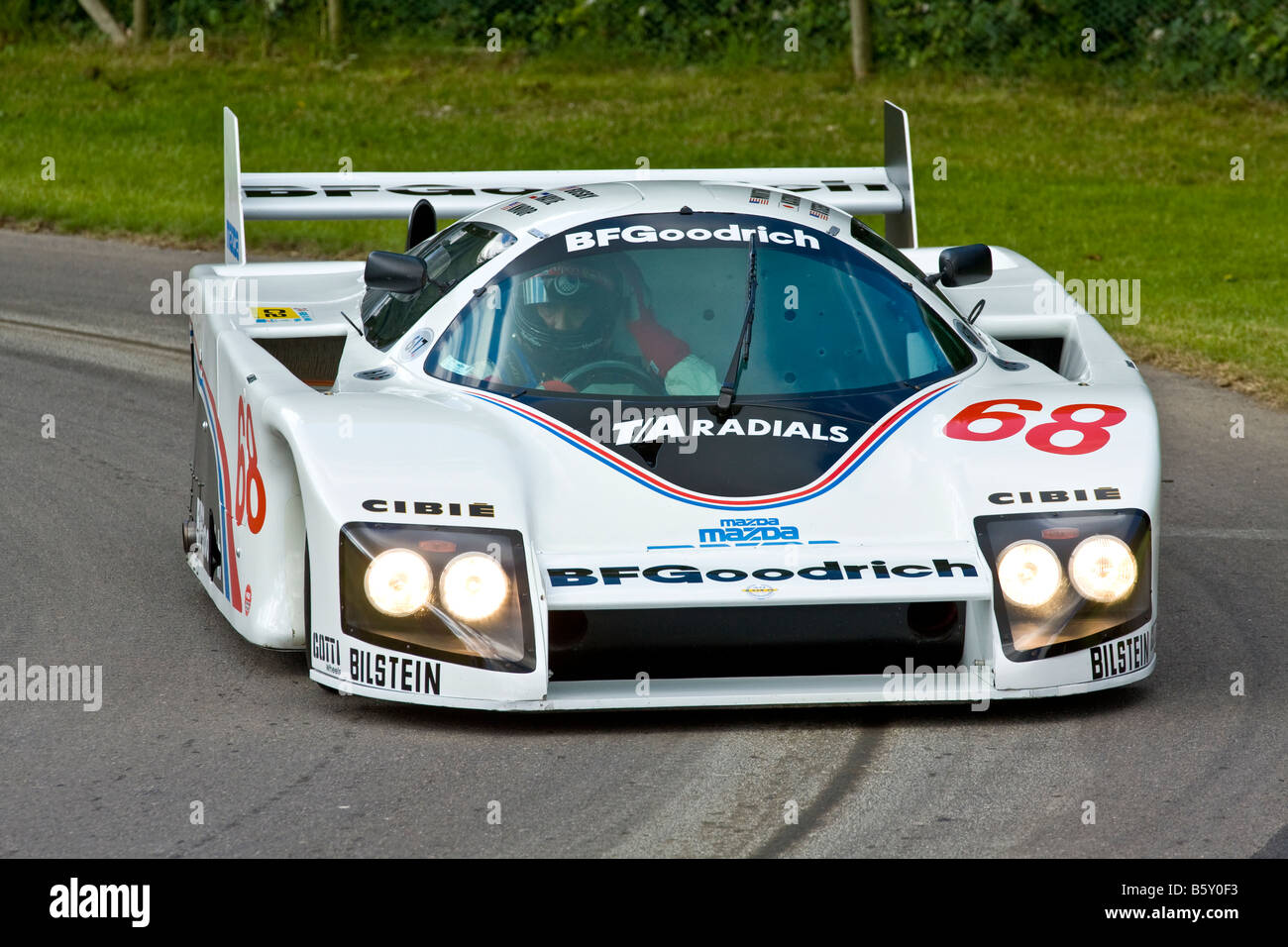 1983 Lola-Mazda T616 with driver Jim Busby at Goodwood Festival of Speed, Sussex, UK. Stock Photo