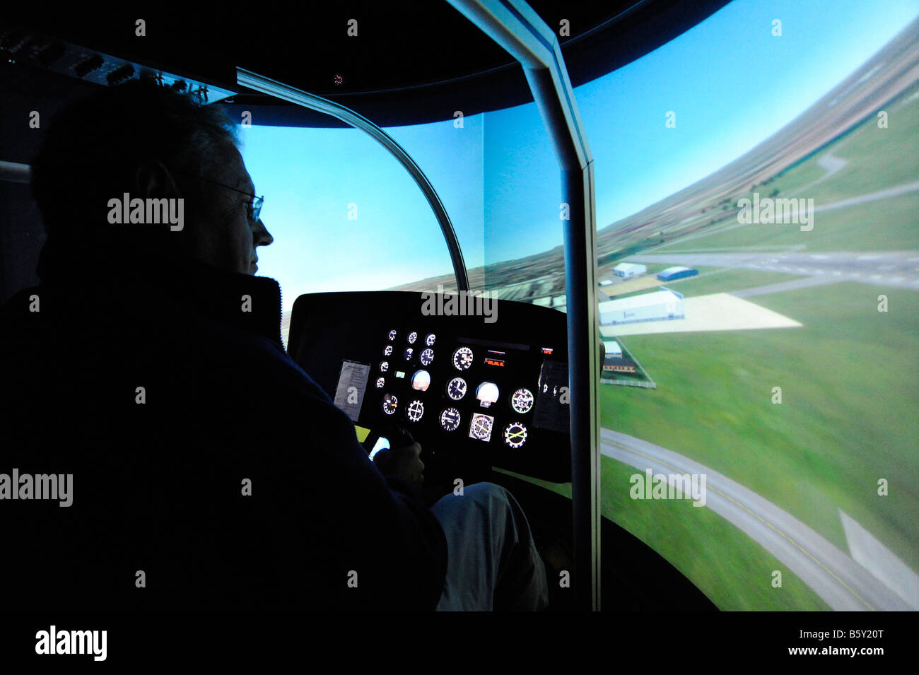 Pilot training in a helicopter simulator Stock Photo