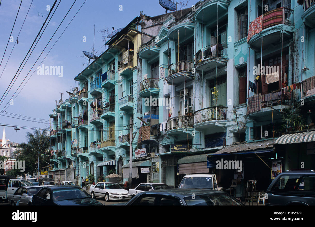 Colonial-era apartment blocks or buildings in old Rangoon or Yangon, Burma or Myanmar Stock Photo