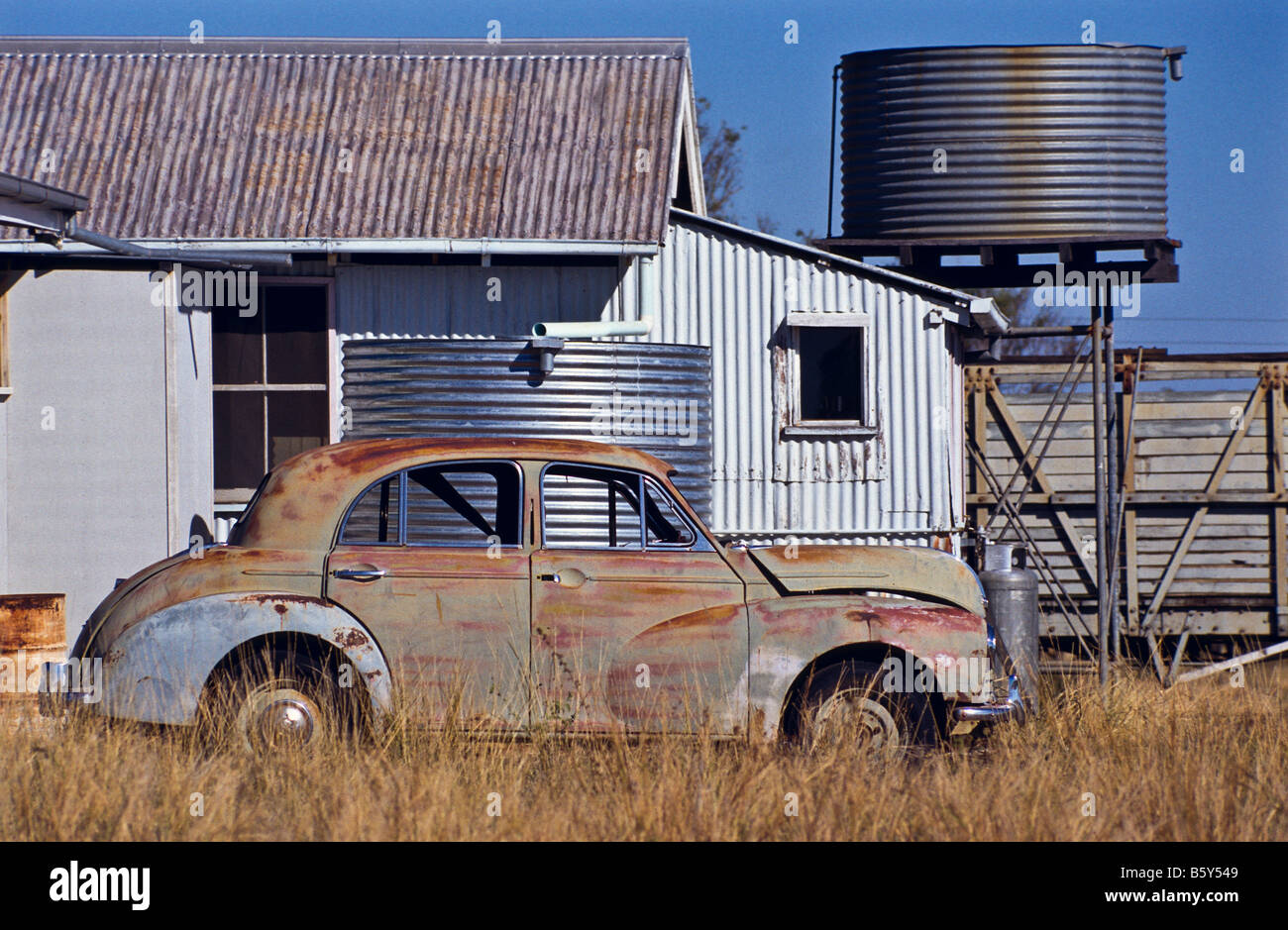 Old car and sheds, outback Australia Stock Photo