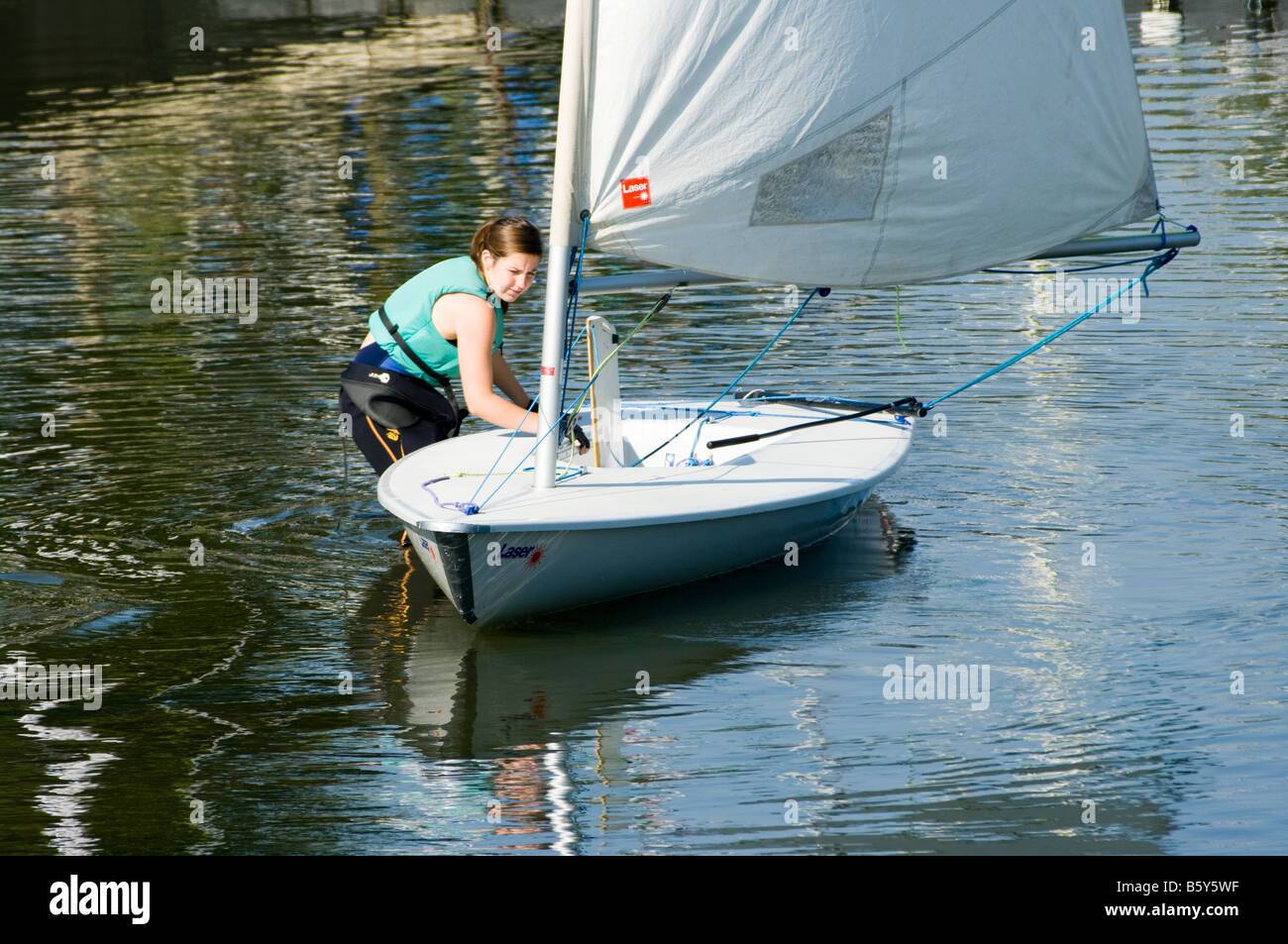 Young Teenage Girl person Landing a Sailing Dinghy Stock Photo Alamy