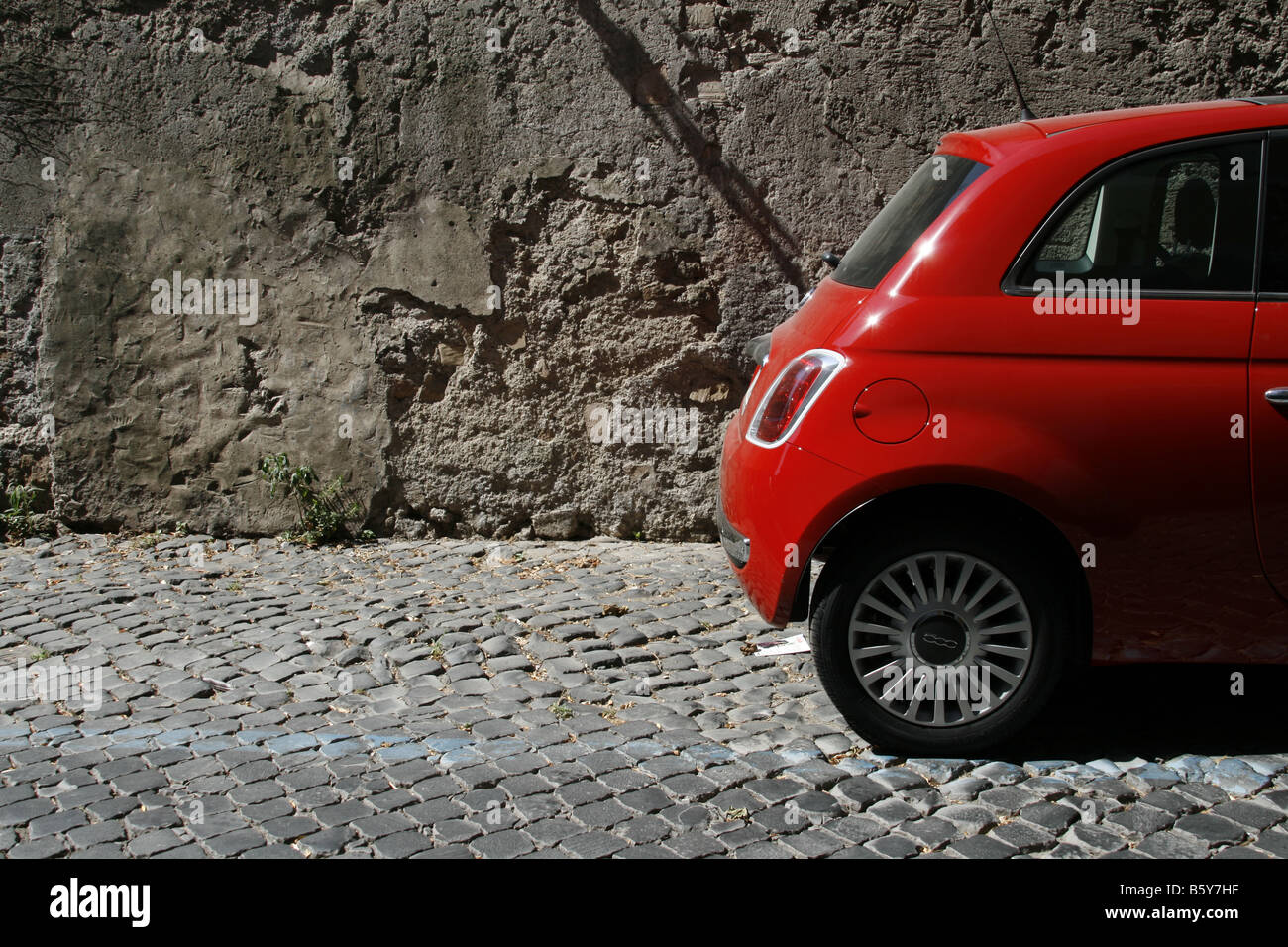 the new model red fiat 500 car in street rome Stock Photo - Alamy