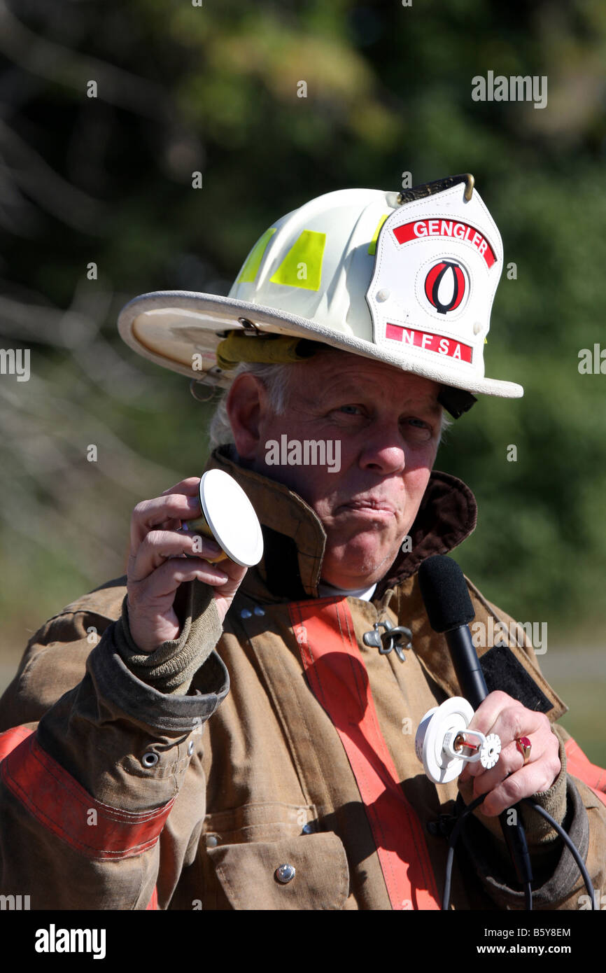 The National Fire Sprinkler Association firefighter showing a fire