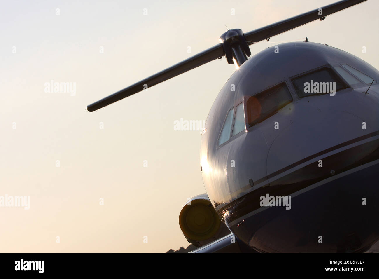 An airplane at an airport Stock Photo