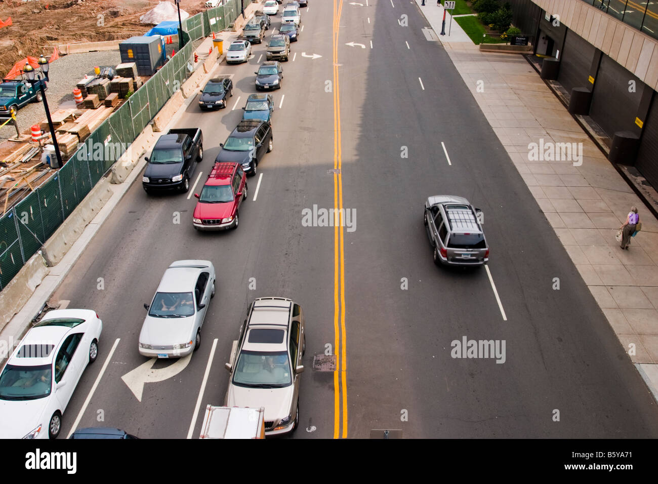 City street with one busy lane and one not busy lane Stock Photo